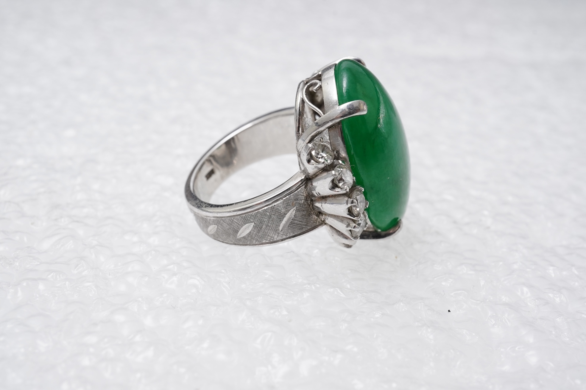 A jadeite and diamond ring, 1960s
